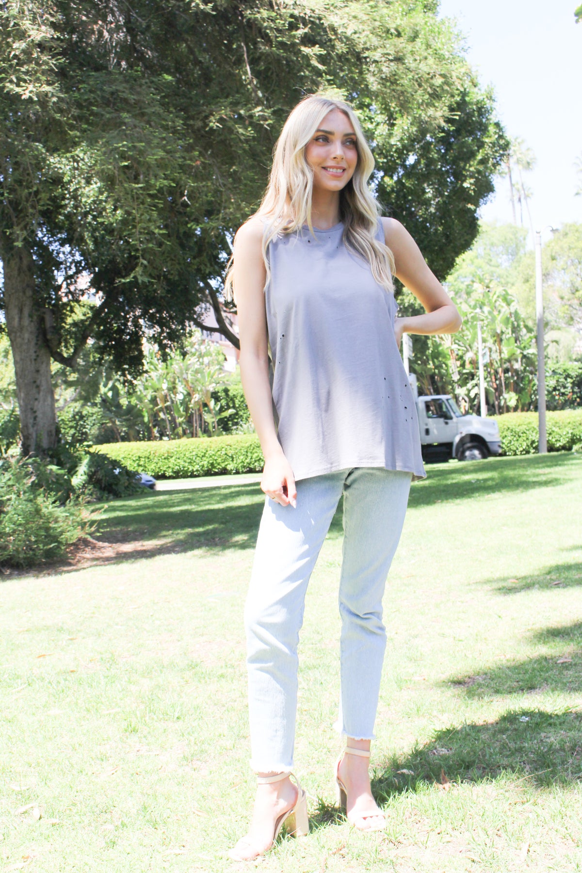 Women's Sleeveless Distressed Solid Top