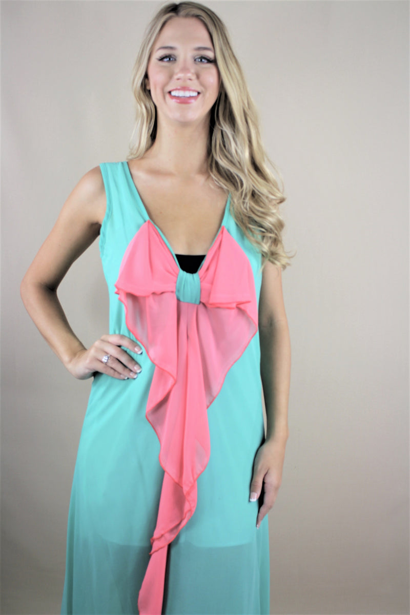 green maxi dress with pink ribbon