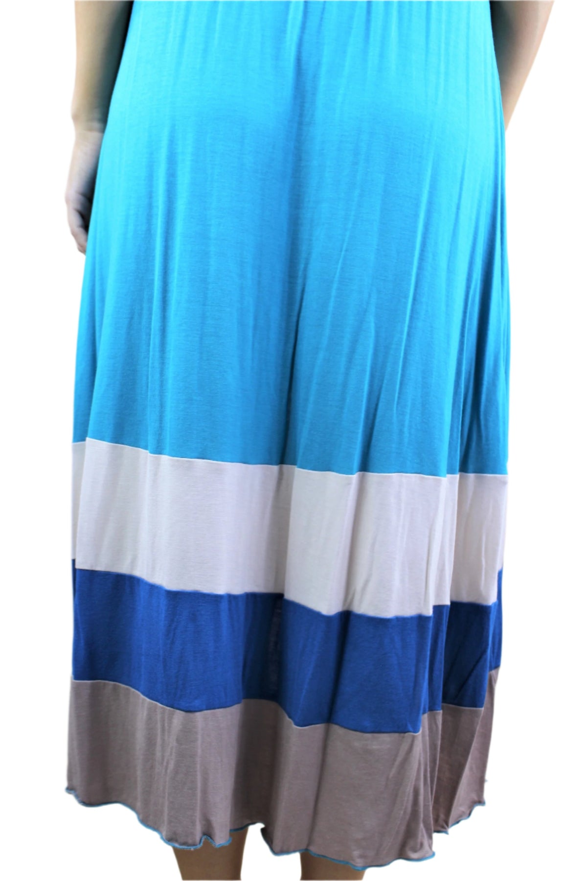 This open back halter dress comes in a blue stripe design and is constructed of 92% rayon and 8% spandex. The flowy design is perfect for your boutique.
